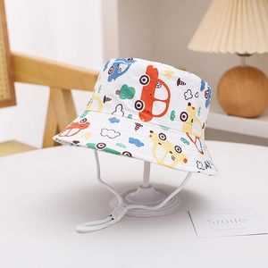 Detail of cartoon car print on white kids bucket hat with adjustable chin strap