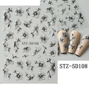 Detailed 5D embossed nail stickers featuring silver glitter flowers and black leaf accents