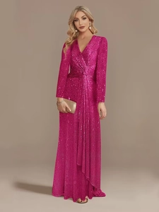 Detail of fuchsia sequin evening gown showing the deep V-neck and twist knot waist detail