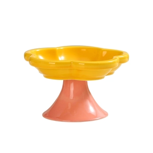 Creative flower-shaped elevated ceramic cat bowl with yellow petals and pink pedestal base