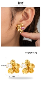 Detail of floral earrings featuring rose gold petal texture and drop zircon inlay