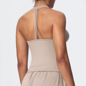 Detail view of T-back sports bra with high-elasticity quick-dry fabric in beige finish