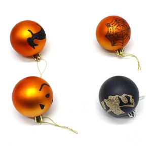 Detail of Halloween ornaments featuring black cat, pumpkin, spider web, and bat patterns