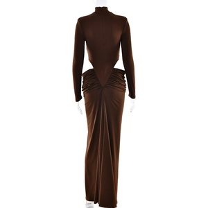 Detailed back view of brown long sleeve dress featuring waist cut-out and ruched texture