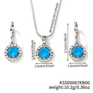 Detailed view of silver jewelry set with blue round stones, necklace and earrings dimensions