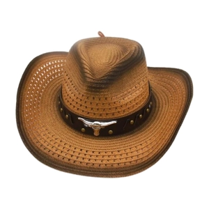Detail of western straw cowboy hat with leather band and silver steer skull ornament