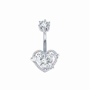 Macro shot of silver navel ring featuring sparkling heart-shaped zircon and pave setting
