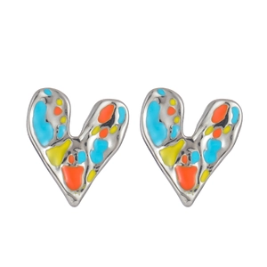 Close-up of colorful enamel drip hearts on polished stainless steel heart earrings
