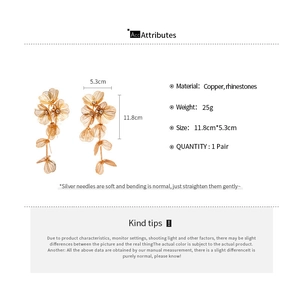 Detailed size specifications for gold flower tassel earrings with rhinestones