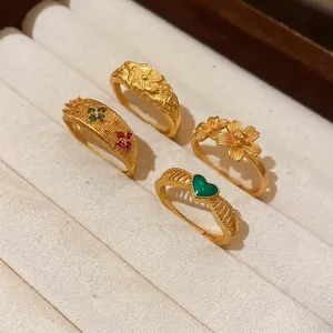Set of four 24k gold zircon flower open rings with vintage floral and heart motifs