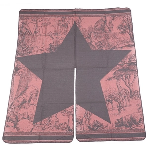 Detail of luxury reversible shawl showing pink and grey star pattern with exotic animal motifs