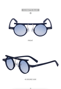 Matte blue steampunk sunglasses with small round frames and gold star accents on pure white back