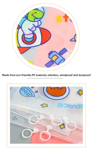 Macro detail of cartoon space dinosaur pattern and smooth slider on transparent pouch