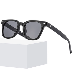 Polarized TAC square sunglasses with black frame and grey lenses on a white platform