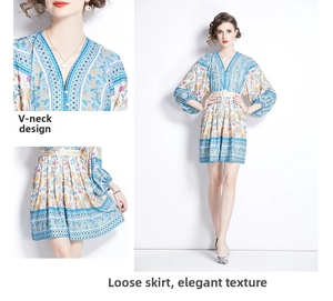 Detail of bohemian V-neck dress featuring ethnic floral prints and puff sleeves