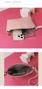 Internal view of pink litchi grain leather crossbody bag showing storage capacity