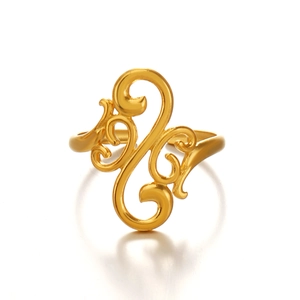 Gold plated stainless steel ring featuring vintage cutout scroll pattern on white background