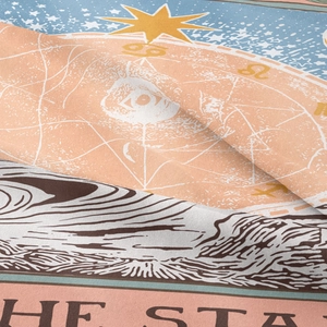Macro shot of fabric texture featuring printed zodiac signs and celestial patterns