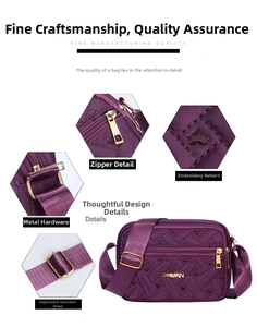 Detail view of purple oxford crossbody bag showing heart embroidery and metal zippers