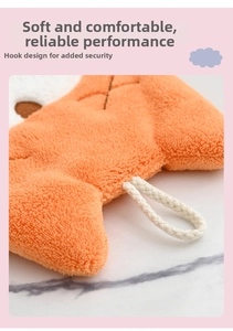 Detail of soft coral fleece hand towel with cute cartoon face and hanging loop