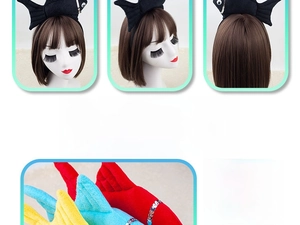 Detail showing plush Halloween fish headband with soft cotton padding and colorful accents