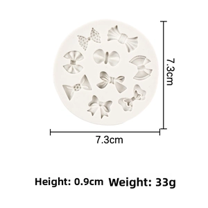 Detailed top view of 7.3cm white silicone fondant mold with various bow tie patterns