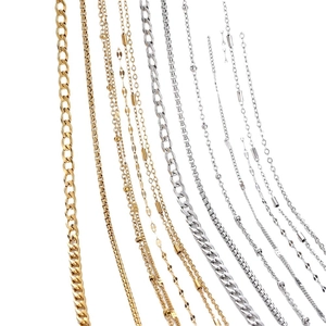 Assorted gold and silver stainless steel chains including Cuban, box, and bead link styles