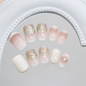Champagne glitter and milky white French ombre press-on nails in short square shape