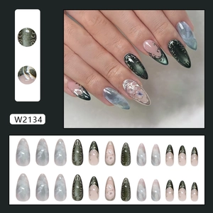 Olive green cat eye press-on nails with marble texture and floral 3D embossed accents