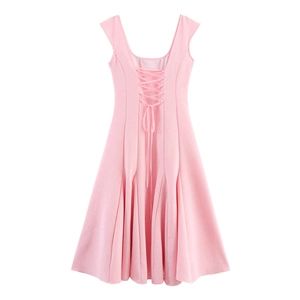 Pink sleeveless French style dress featuring an elegant lace-up corset back design