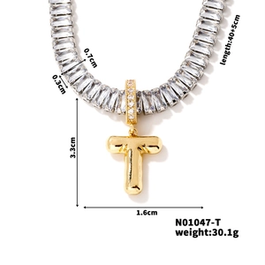 Detailed view of silver zirconia chain with golden letter T pendant and size dimensions
