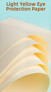 Macro detail of eye-protection sketch paper with a smooth yellowish surface for drawing