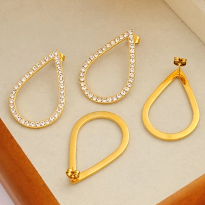 Elegant gold-tone teardrop earrings set featuring crystal pavé and minimalist metal loops