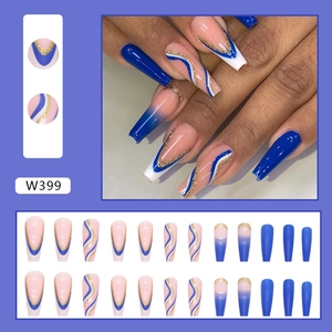 Close-up of W399 coffin press-on nails with blue and nude pink geometric patterns