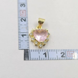 Size measurement of golden heart pendant with pink zircon and white stones