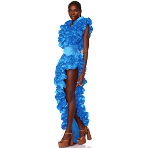 Detail of multi-layered electric blue ruffled dress with satin finish on high-end garment