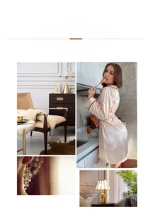 Détail d'un peignoir en satin rose avec dentelle et accessoires déco style vintage