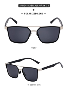 Detail view of sand silver frames and polarized gray lenses on high-end sunglasses
