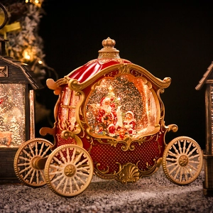 Vintage Christmas carriage music box with glowing crystal ball and Santa Claus figure