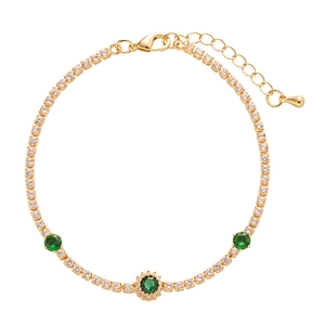 Vintage gold tennis bracelet with emerald green zircons and round halo crystals