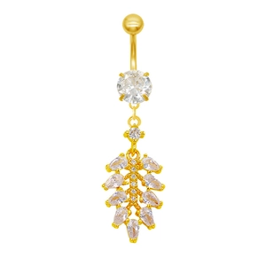 Macro detail of golden navel piercing ring with marquise zircon stones and leaf pendant