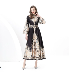 Detail of vintage court style long dress featuring paisley prints and a high mandarin collar