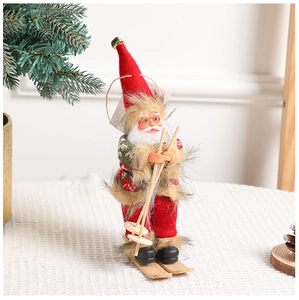 Detailed view of skiing Santa Claus ornament with wooden skis and faux fur trim