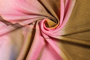 Detailed macro view of sheer mesh fabric with pink and brown gradient print texture