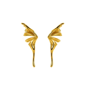 Close-up of golden titanium steel butterfly wing earrings with polished mirror finish