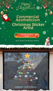 Close-up of a modern Christmas tree window sticker with colorful stars and spiral patterns