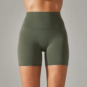Close-up of olive green high-waisted yoga shorts with seamless double-sided brushed texture