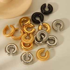 Fashion C-shaped geometric ear cuffs in gold, silver and black metal with textured patterns