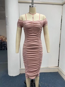 Detail view of pink off-shoulder bodycon dress featuring elegant horizontal pleats