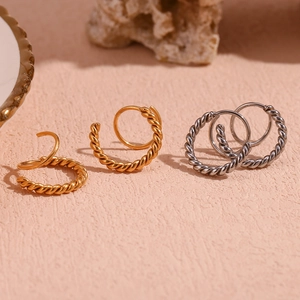 Twisted rope hoop earrings in gold and silver finish, minimalist stainless steel jewelry